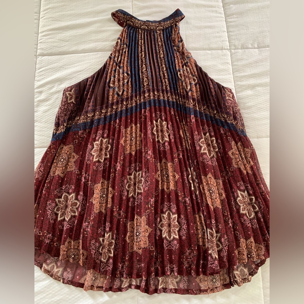 Maroon pleated and patterned high neck dressy sleeveless top